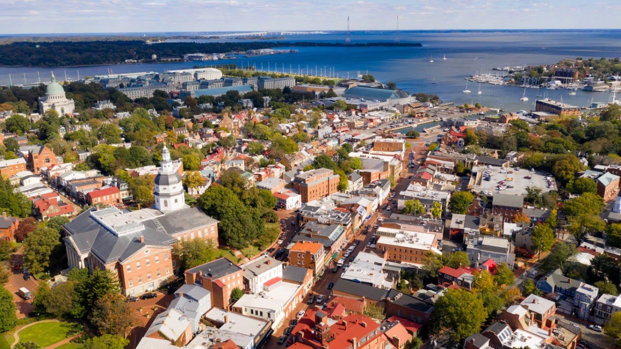 Aerial view of downtown Annapolis, the Maryland State House, the Naval Academy, and the waterfront