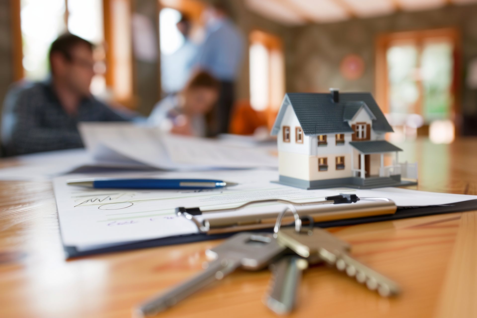 Planning materials on a desk during a real-estate strategy session